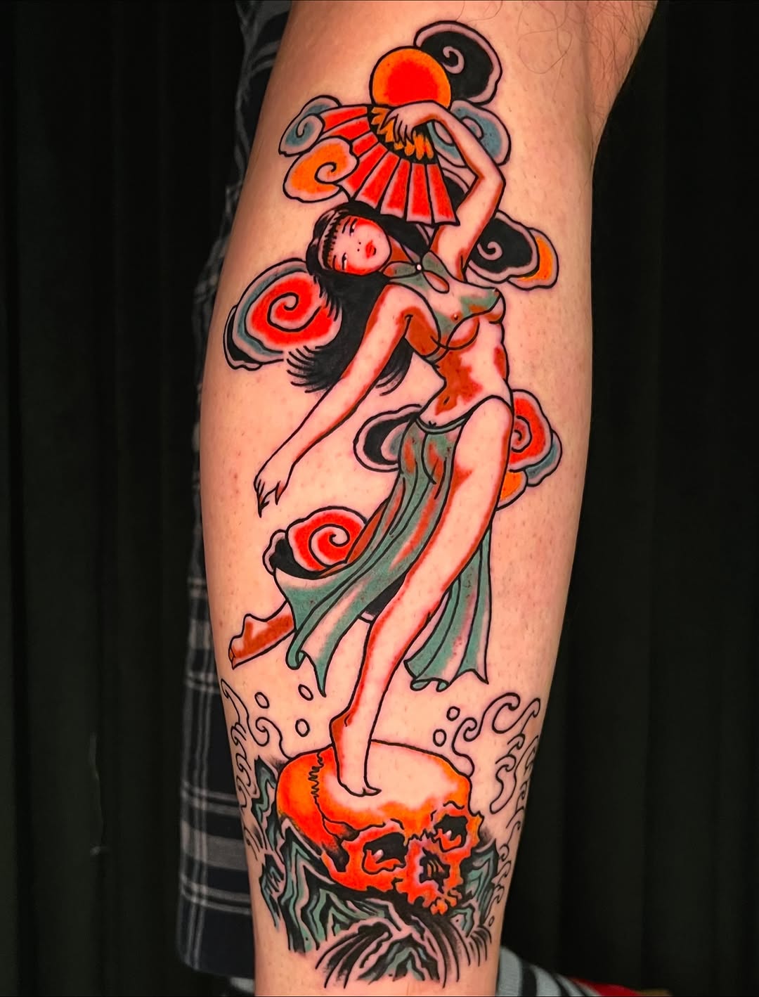 Vibrant traditional pin-up dancer amid sunburst and clouds