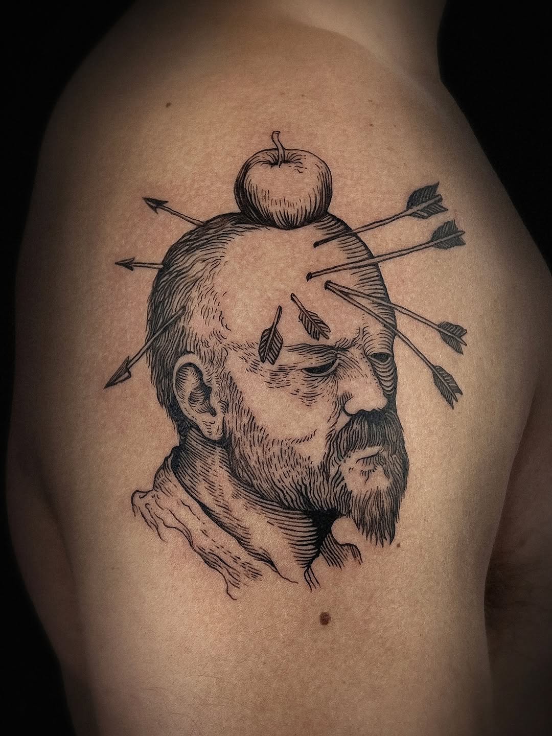 Engraved woodcut-style thinker portrait with arrows and apple.