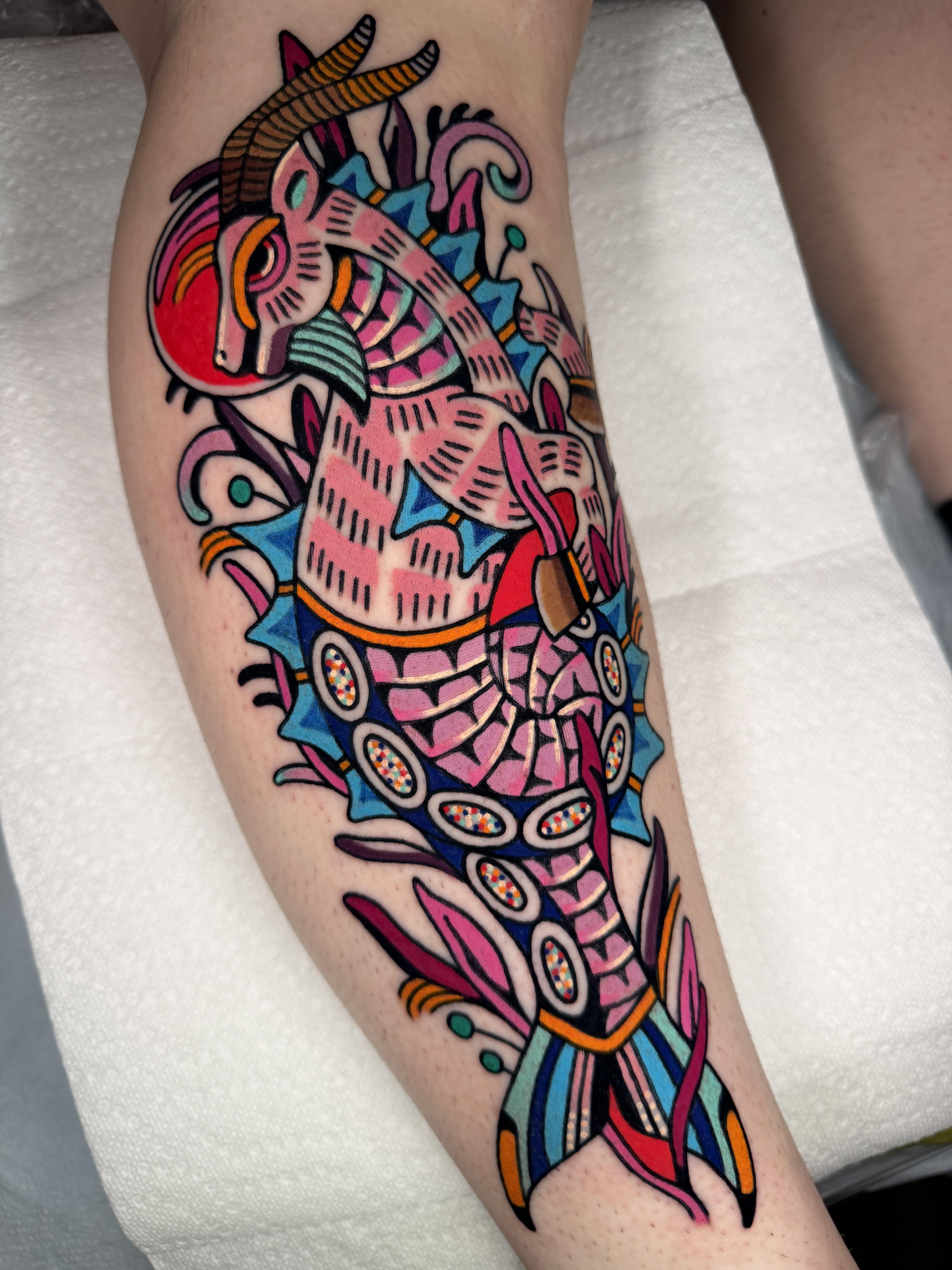 Vibrant bold-line neo-traditional crustacean tattoo, vivid color-blocking