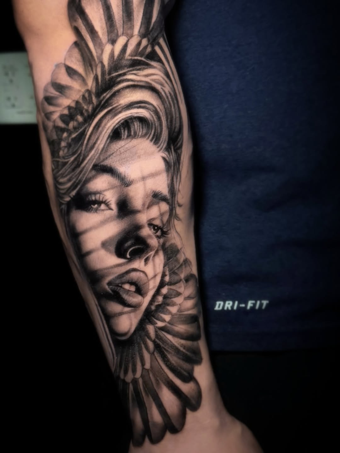 Photorealistic grayscale portrait with feathered wings framing