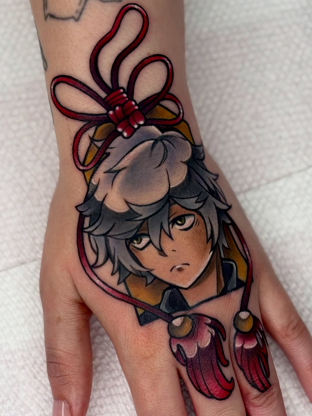 Vibrant anime-style portrait of Gabimaru with bold red bow.