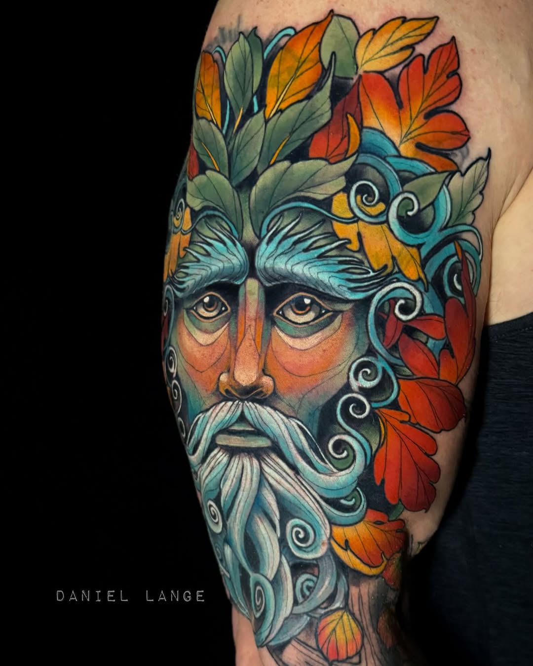 Colorful green man tattoo