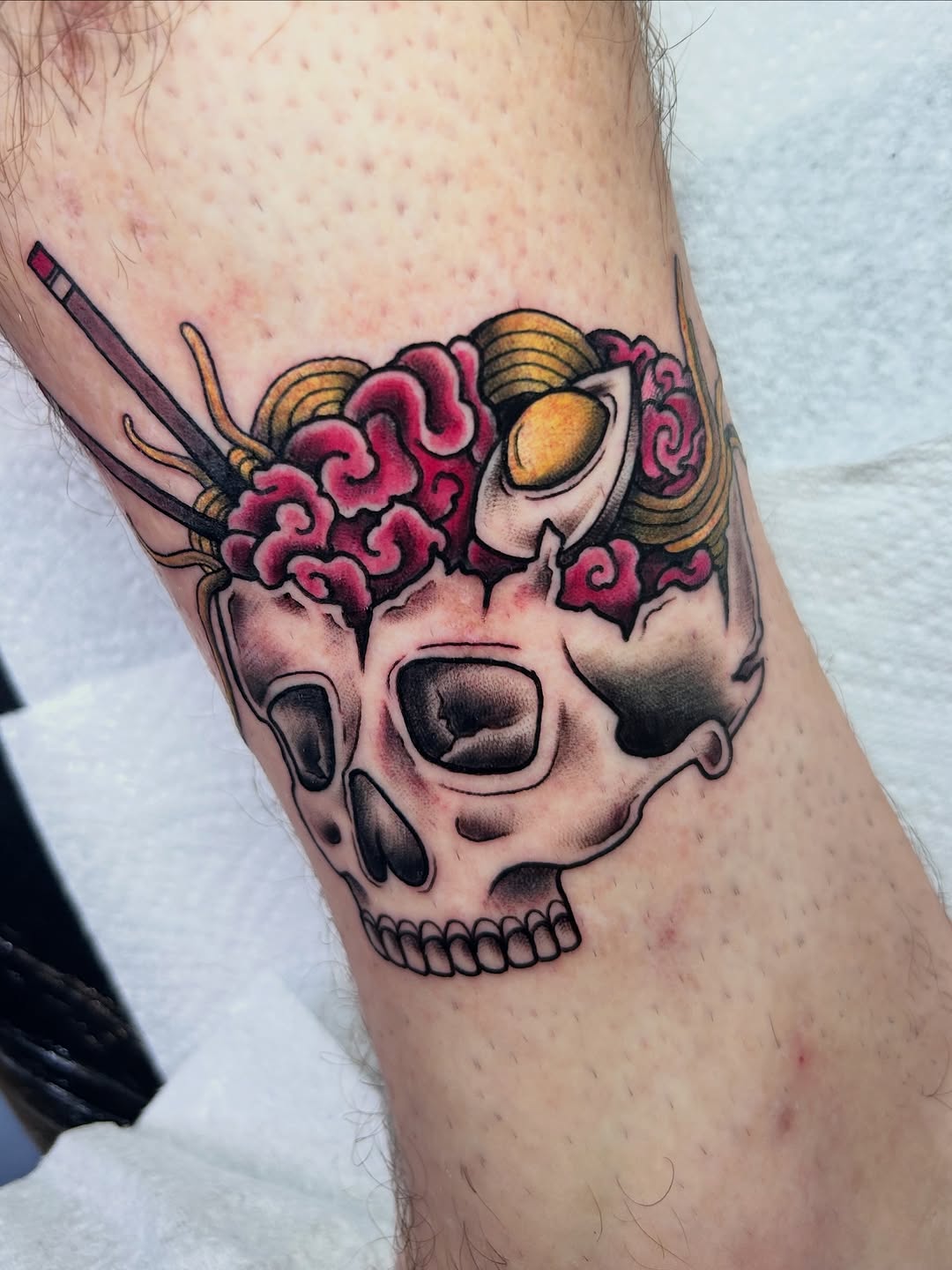 Bold skull with pink brain and ramen elements