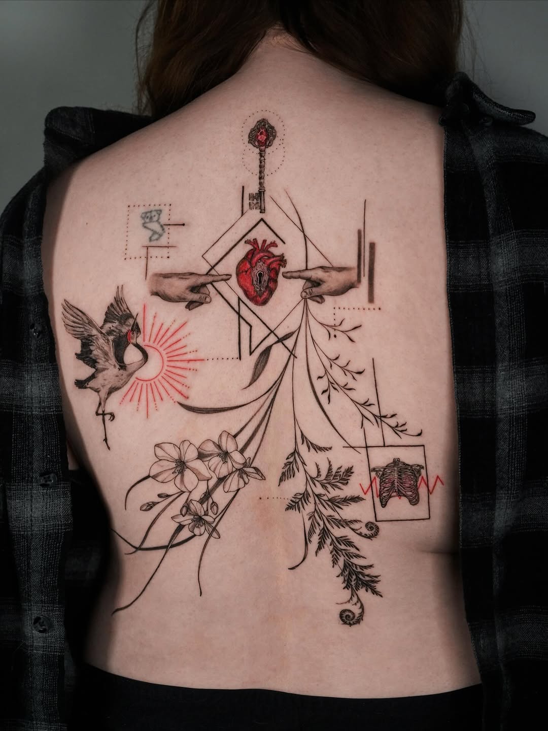 Geometric heart centerpiece with vines, bird, and blooms