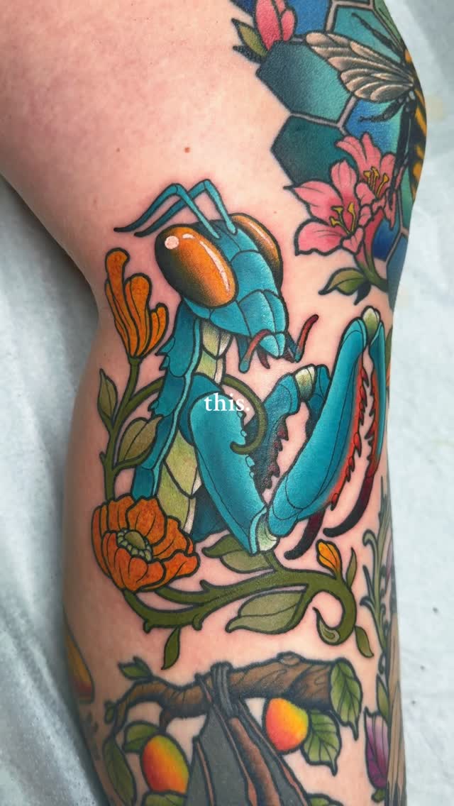 Colorful praying mantis tattoo