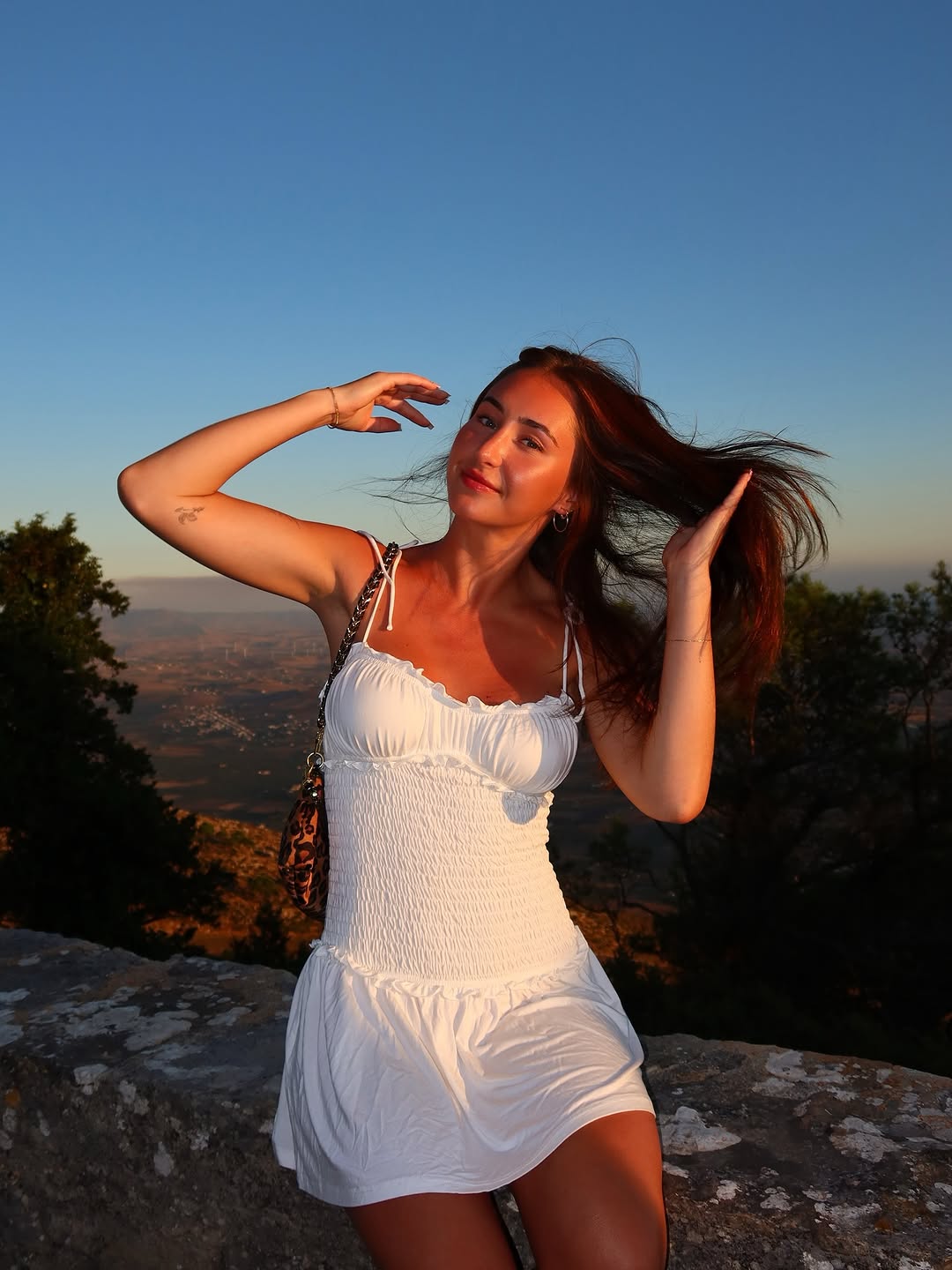 Subtle minimalist fineline tattoo on inner upper arm