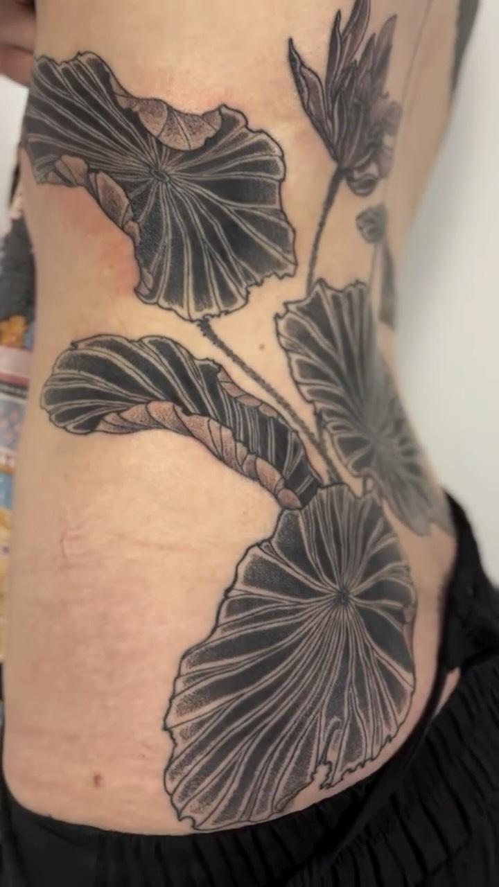 Bold blackwork ginkgo leaves with flowing venation.