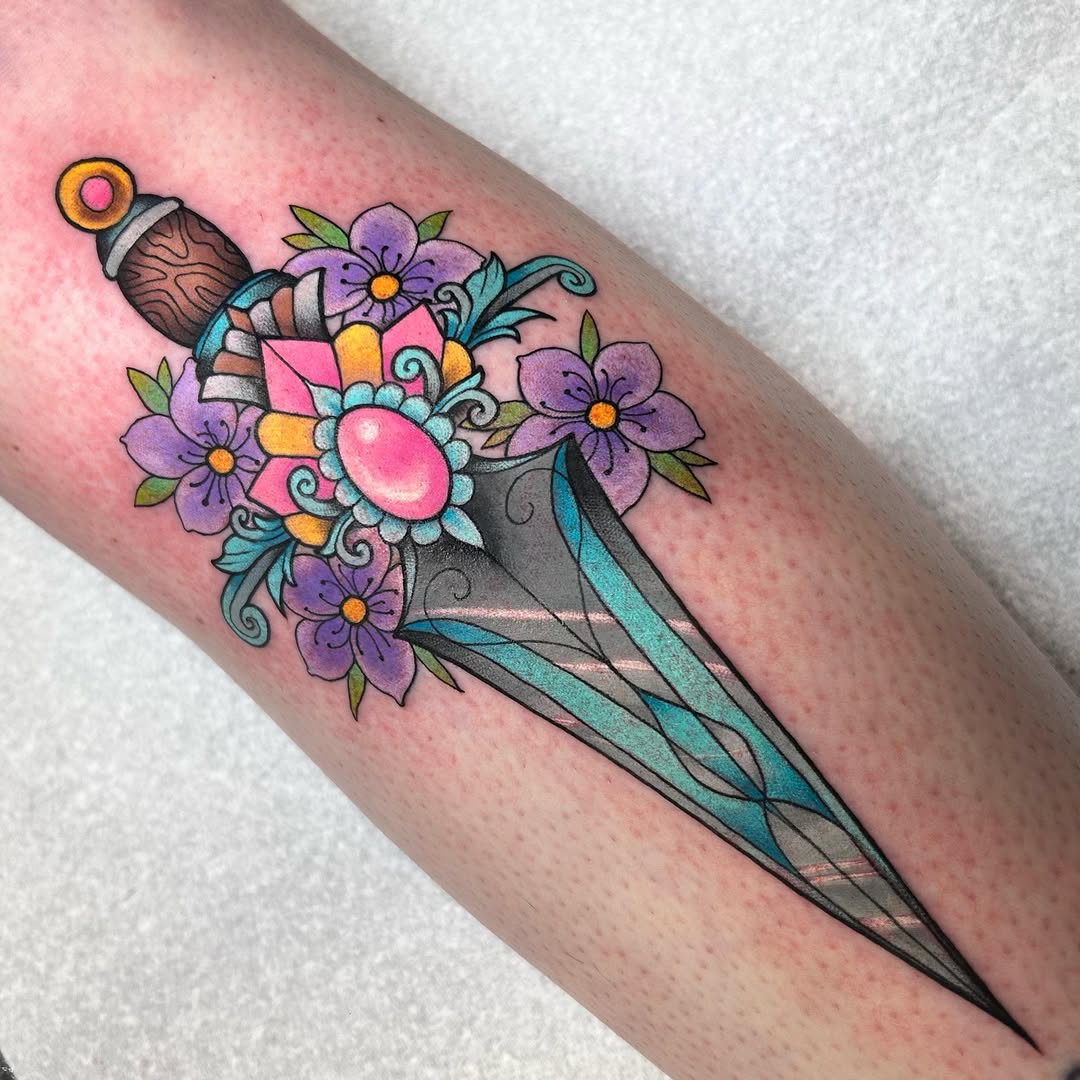 Vibrant dagger surrounded by purple blossoms and teal facets.