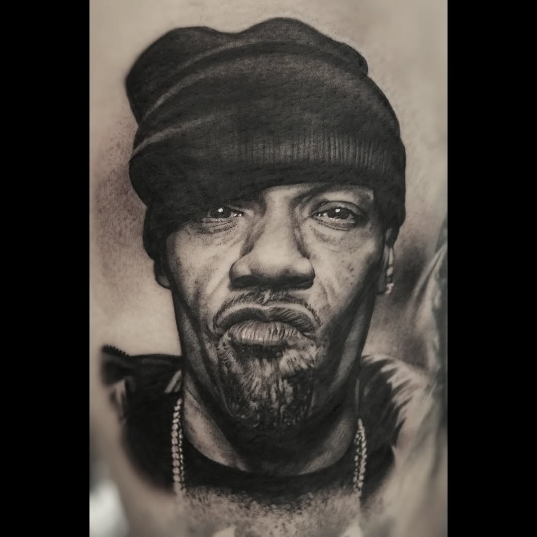 Hyper-realistic black-and-gray male portrait with intense expression