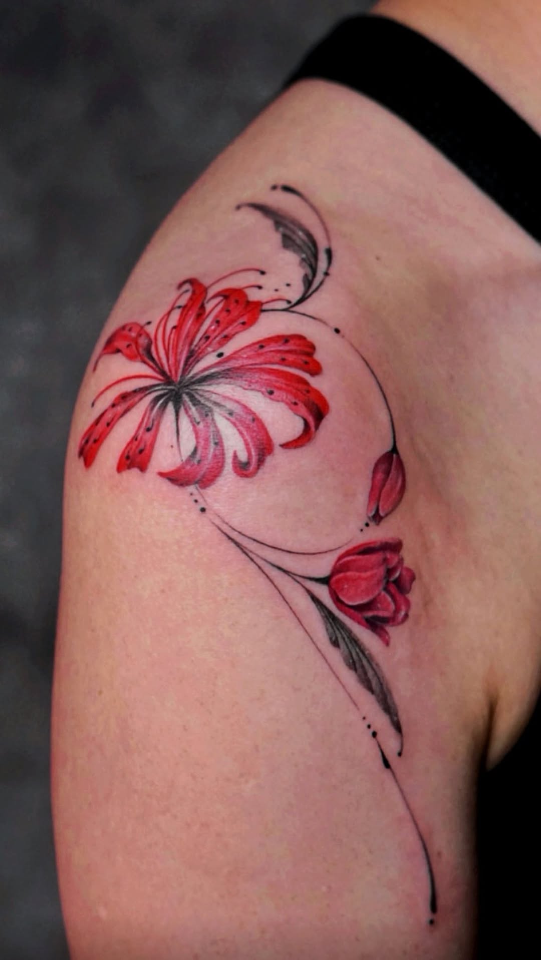 Elegant red spider lily and tulip with fluid lines.