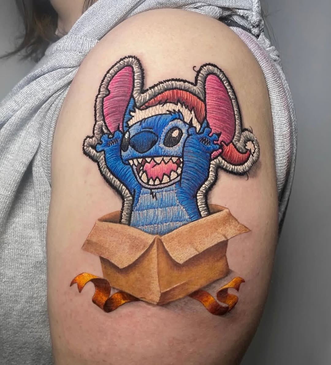 Vibrant cartoon Stitch-like character bursting from an envelope