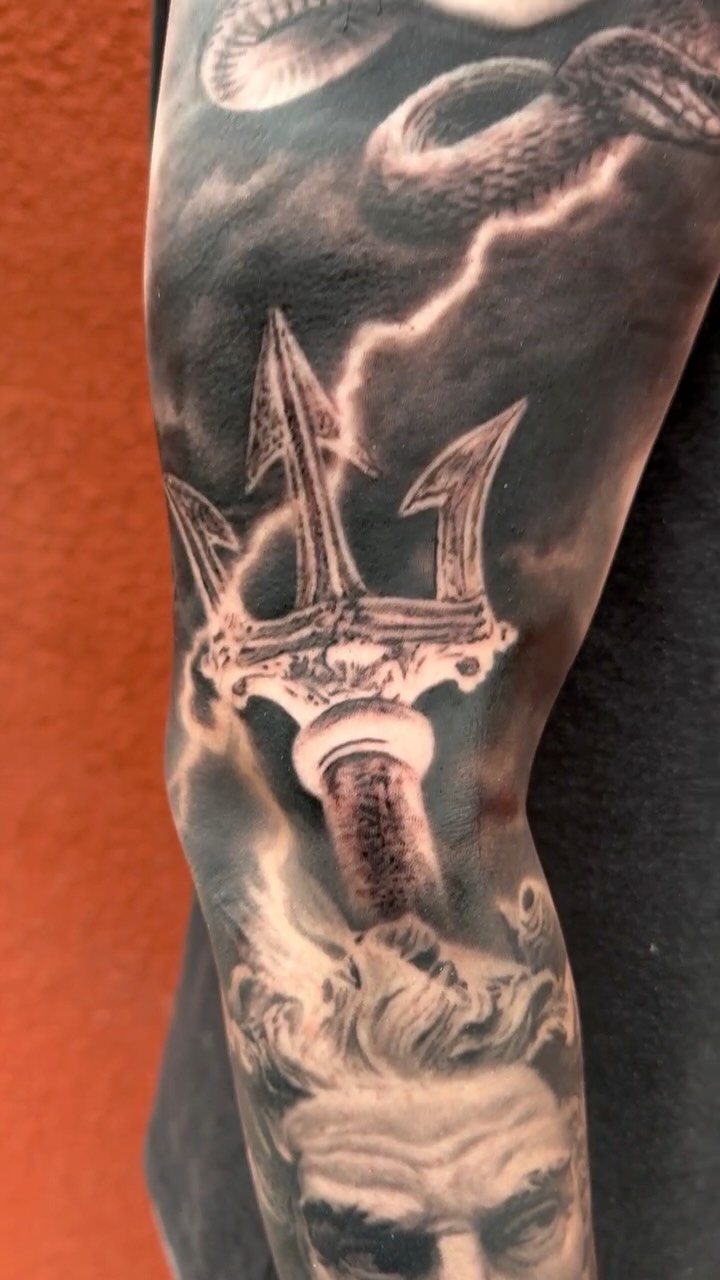 Stormy black-and-gray Poseidon trident panel with waves