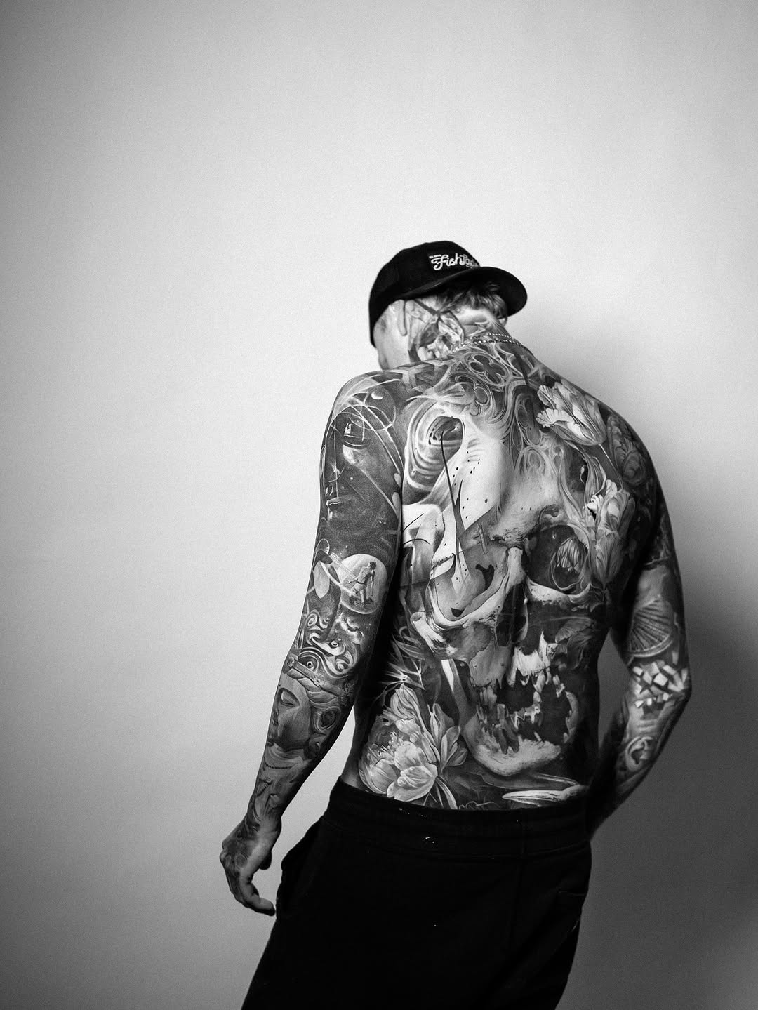 Detailed back piece tattoo