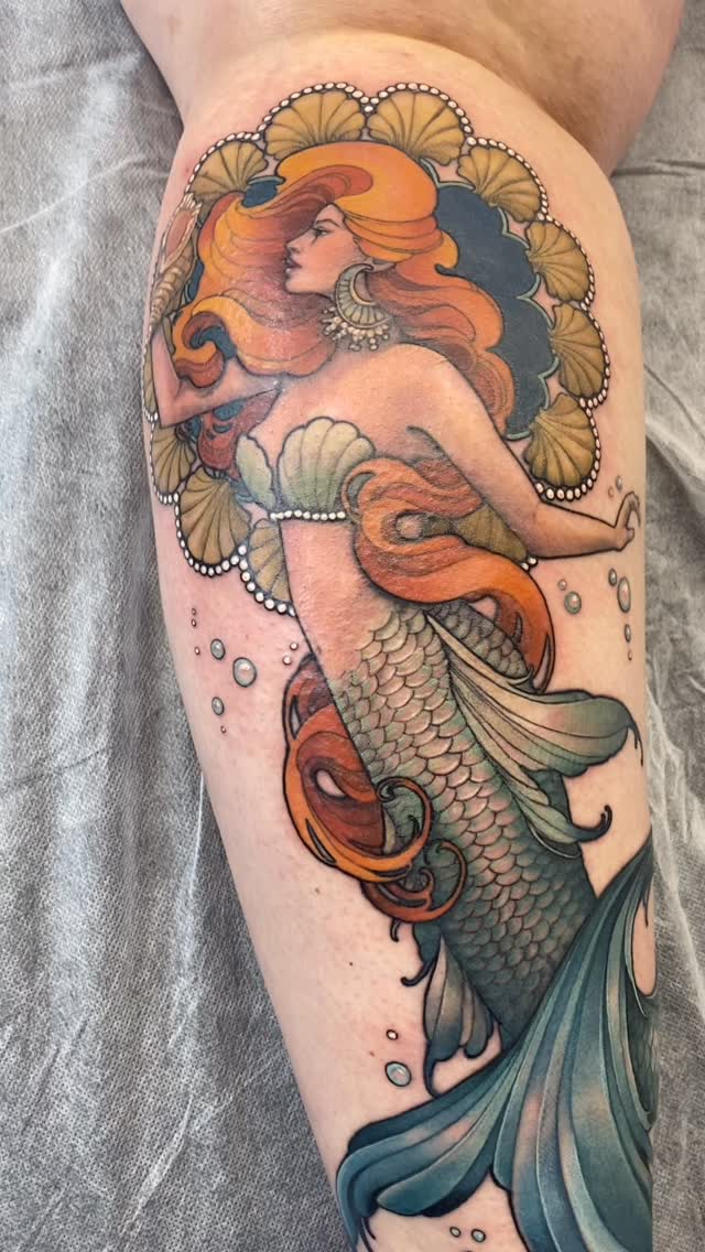 Vivid Art Nouveau mermaid with orange hair and teal tail