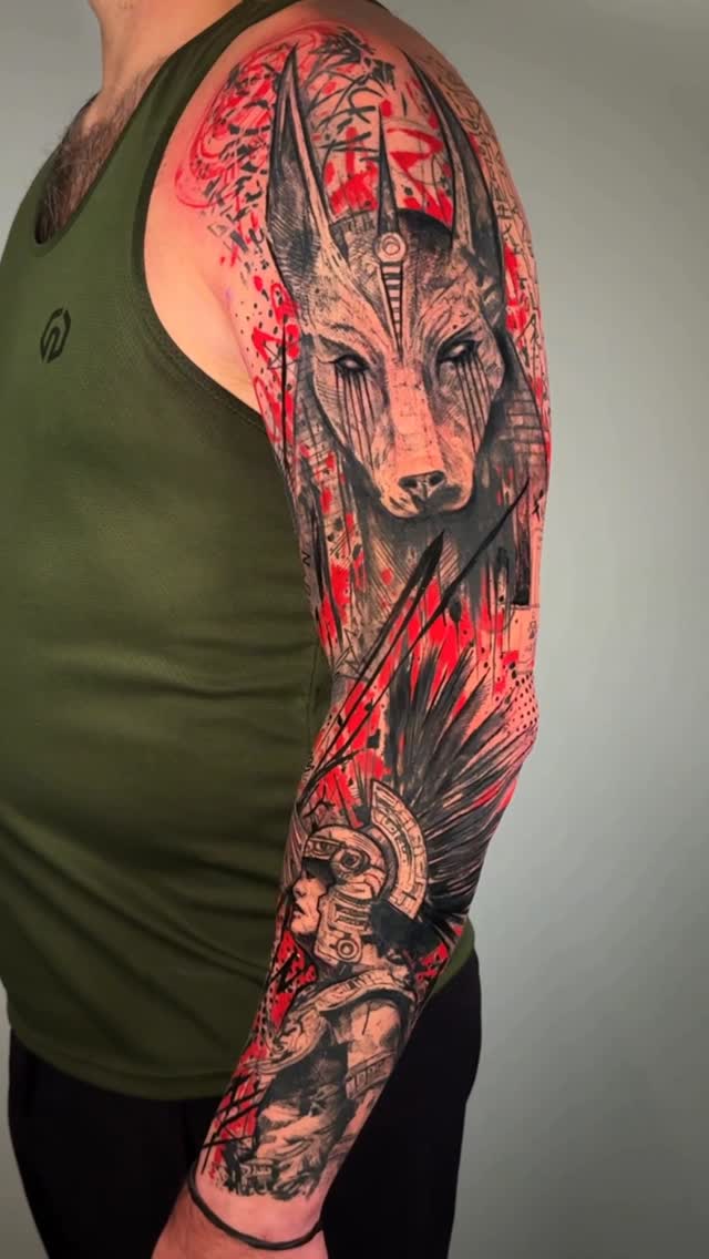 Intense black-and-gray Anubis sleeve with red splashes