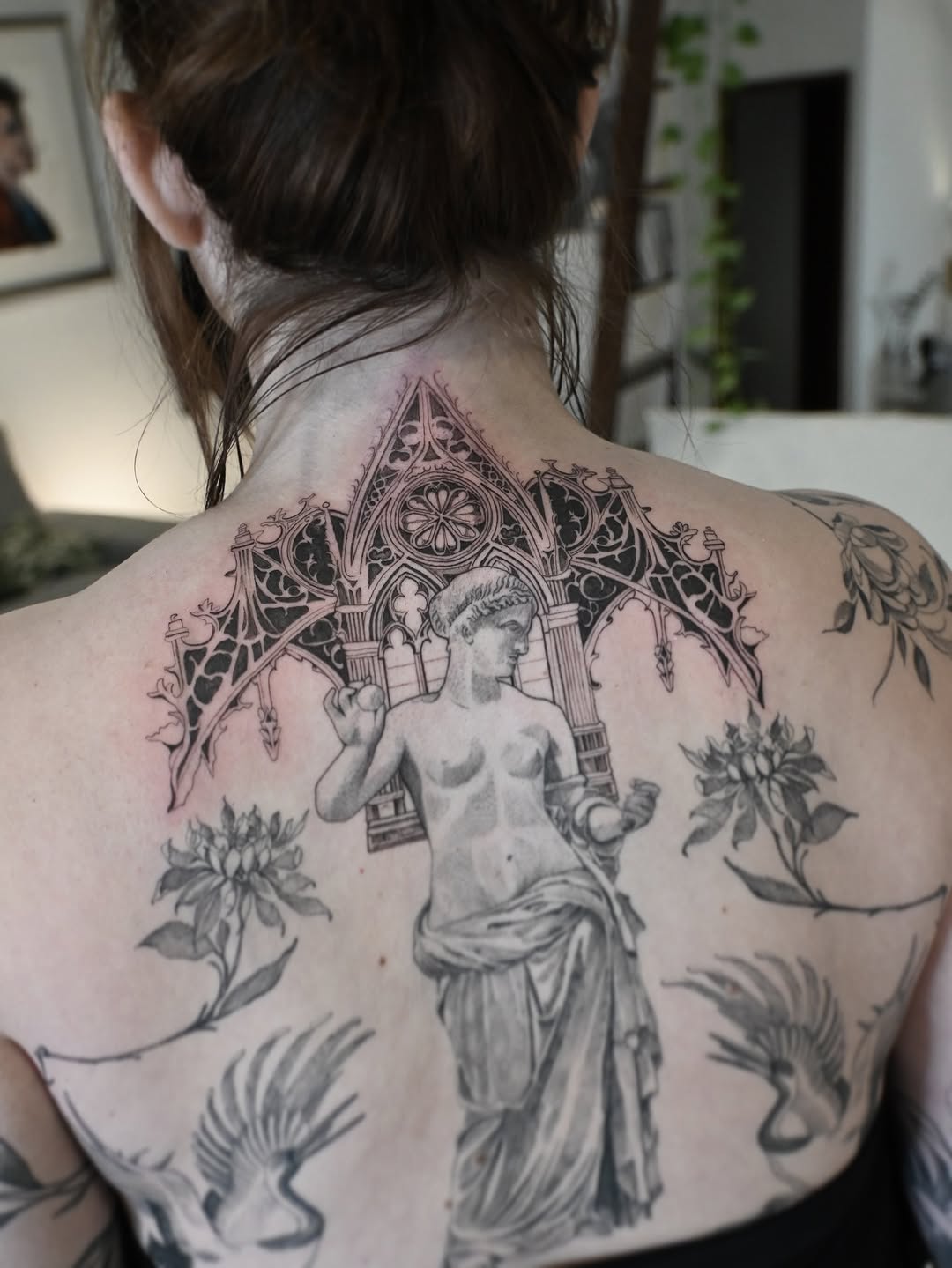 Gothic arch back piece with classical statue motif