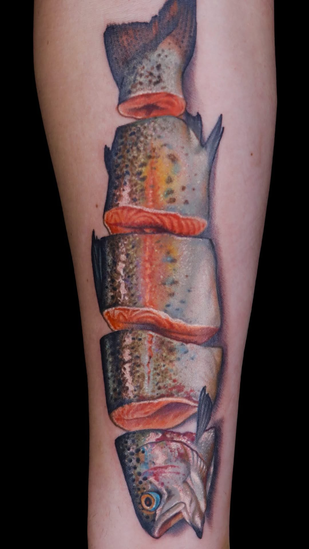 Hyper-realistic fish segments with vibrant colors and shading