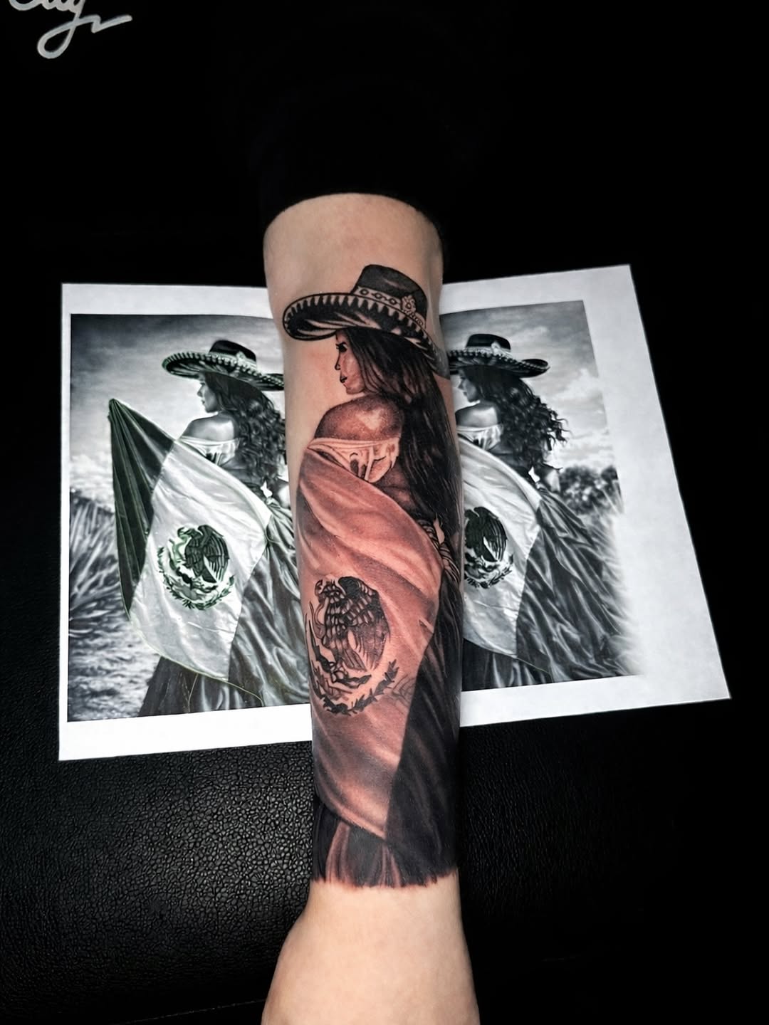 Velvety black-and-gray realism of a seated woman