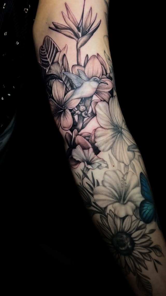 Lush tropical floral sleeve with hummingbird and butterfly