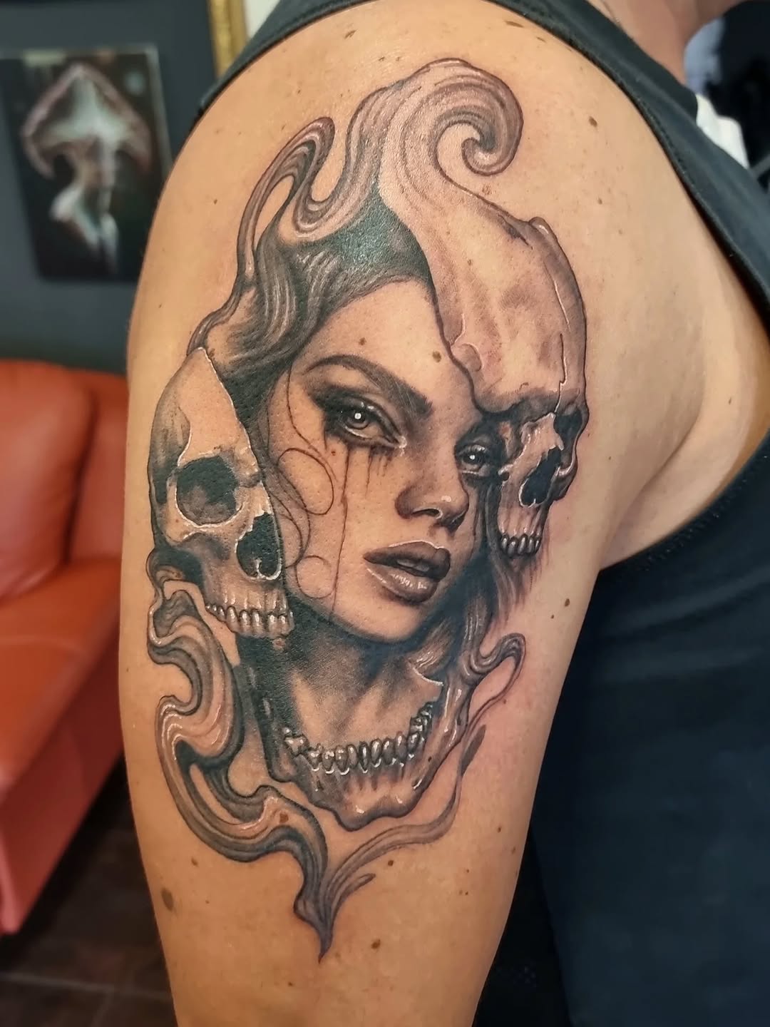Gothic femme portrait entwined with skulls and smoke