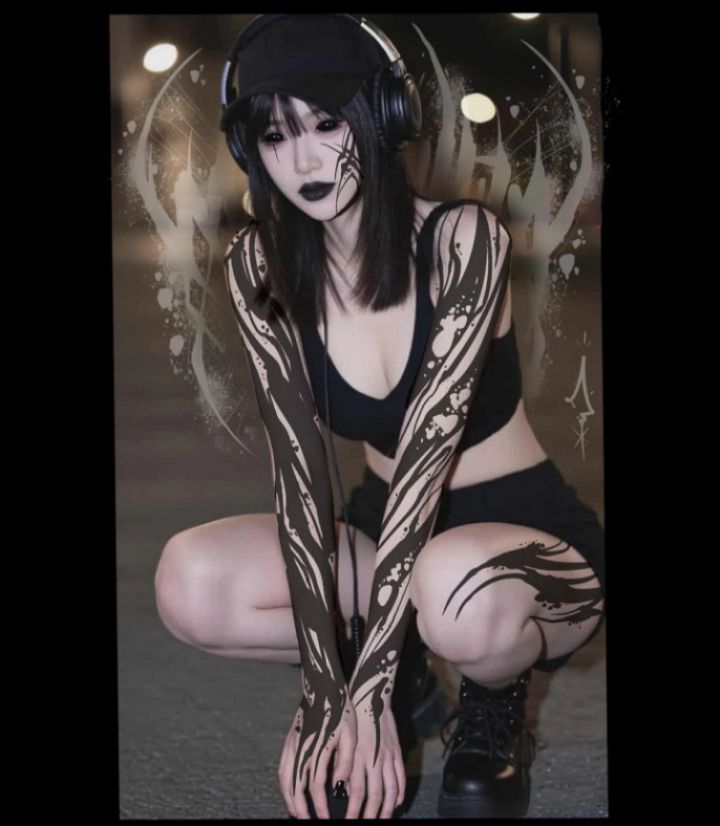 Bold blackwork abstract pattern wraps both arms in negative space