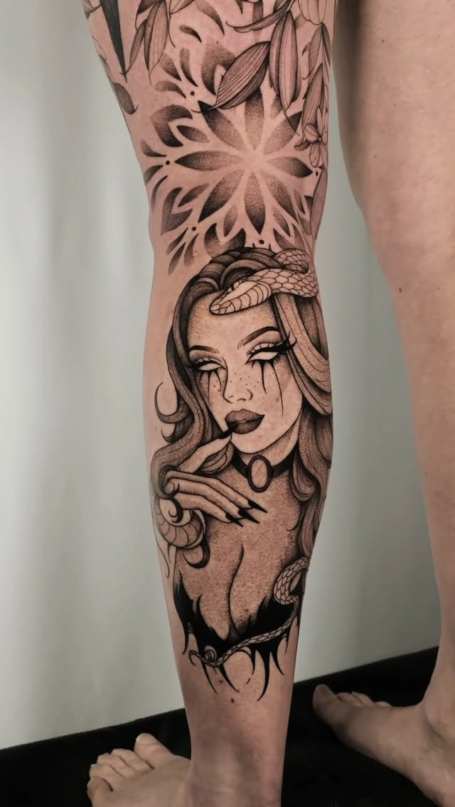 Gothic illustrated female portrait with serpent detail.