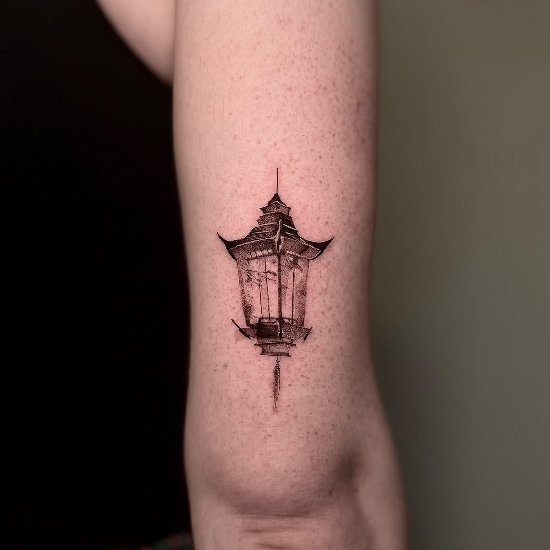 Delicate fine-line Japanese lantern with subtle shading.