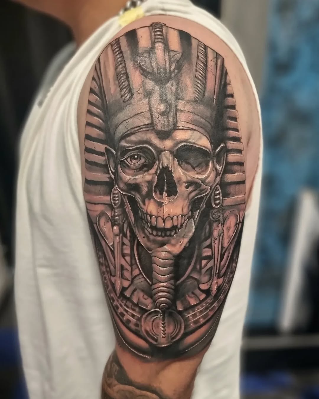 Hyper-detailed pharaoh skull with ornate headdress.