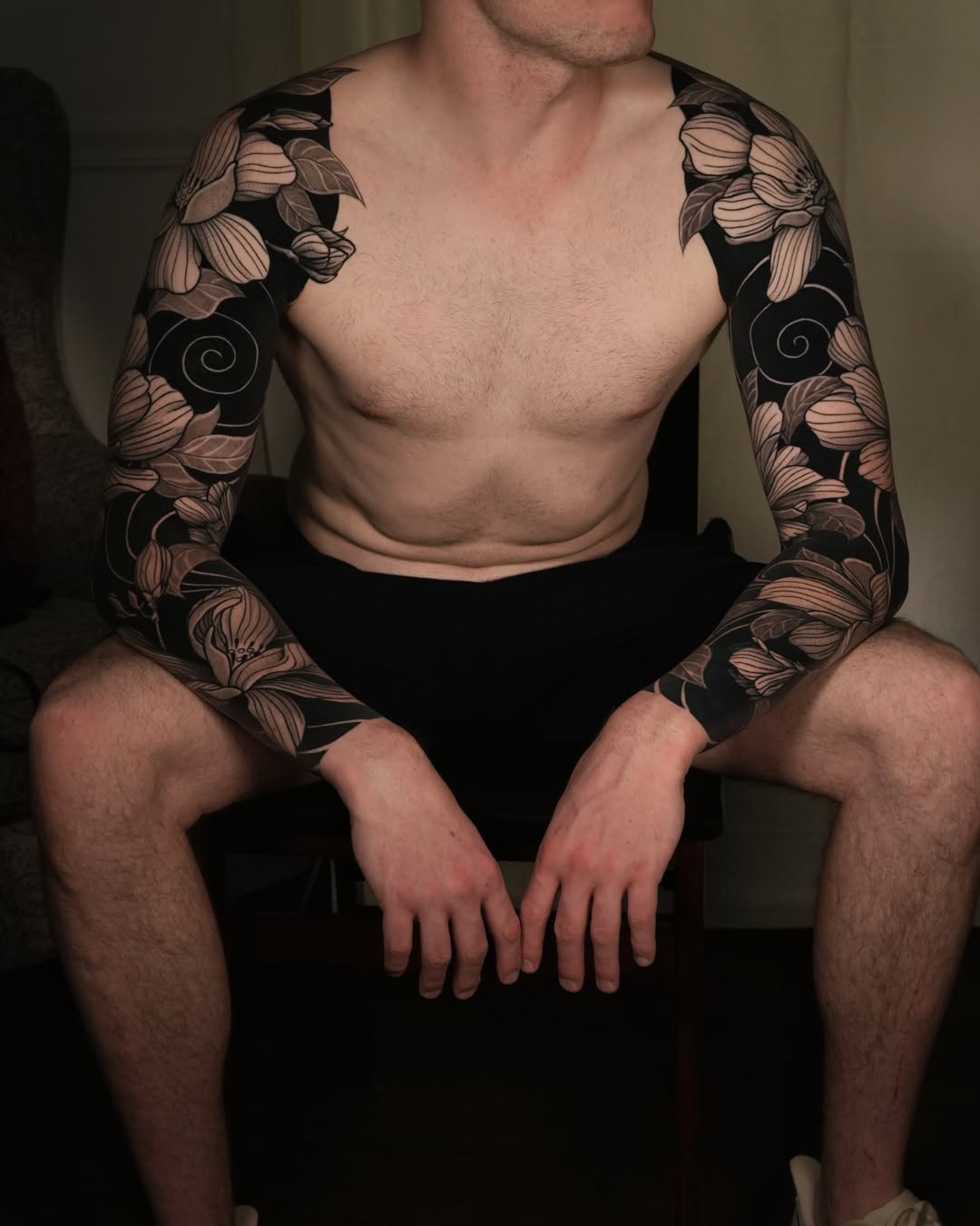 Healed double sleeve tattoo