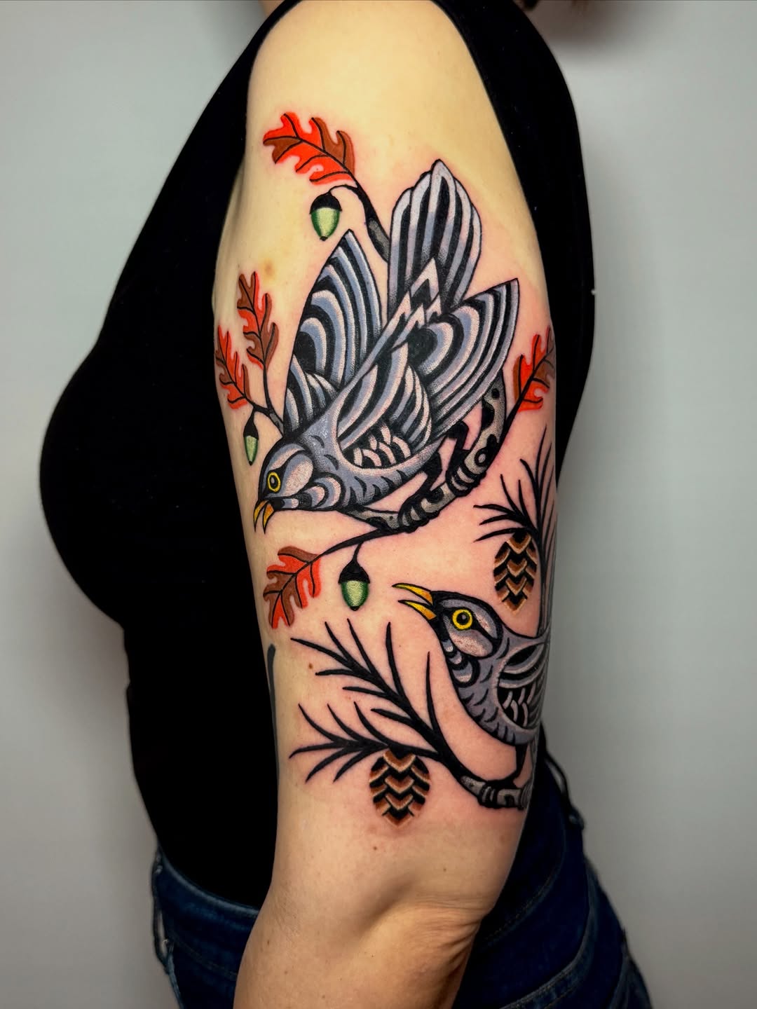 Bold, traditional-style blackbirds with vivid branches and leaves.