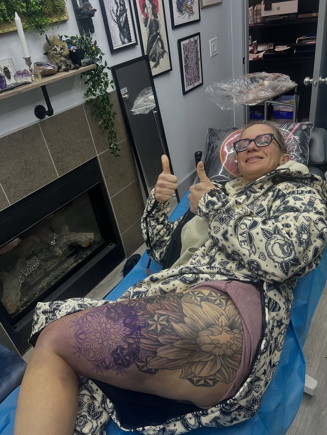 Intricate grayscale floral thigh piece with mandala-inspired petals