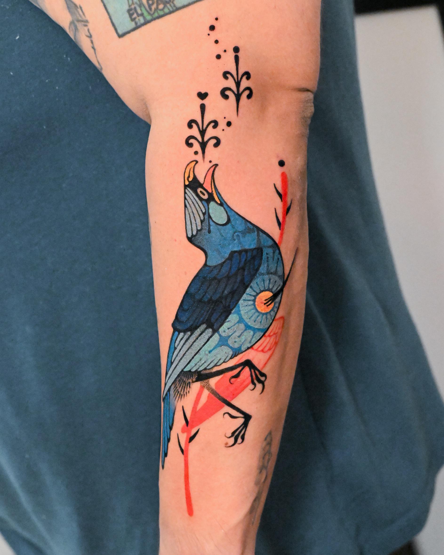 Neo-traditional blue bird with bold outlines and flourishes