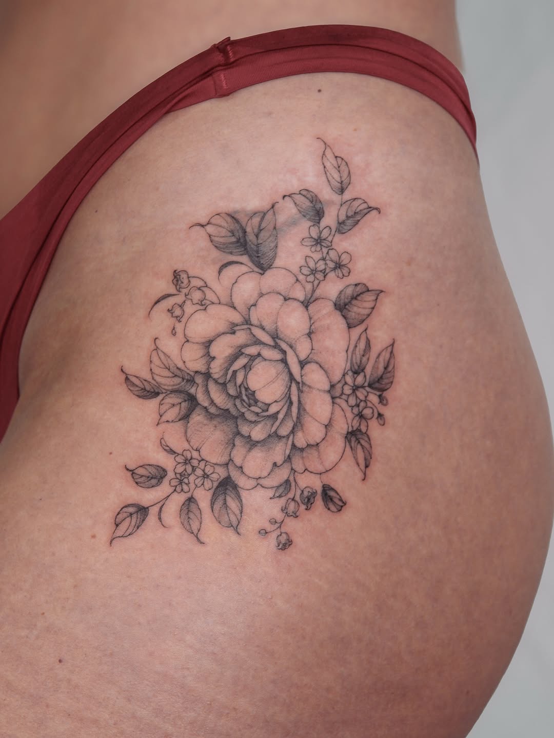 Delicate line-work floral cluster with shaded petals