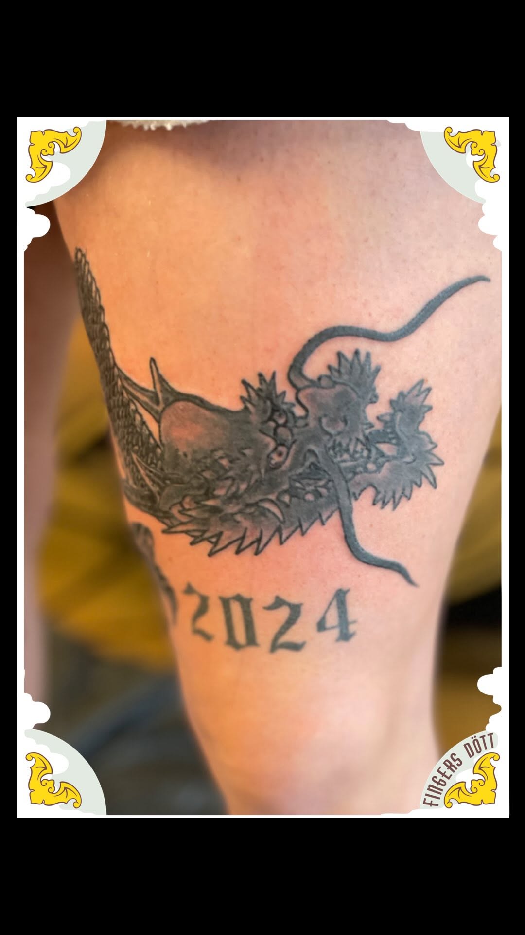 Coiled Japanese dragon tattoo with bold scales and whiskers