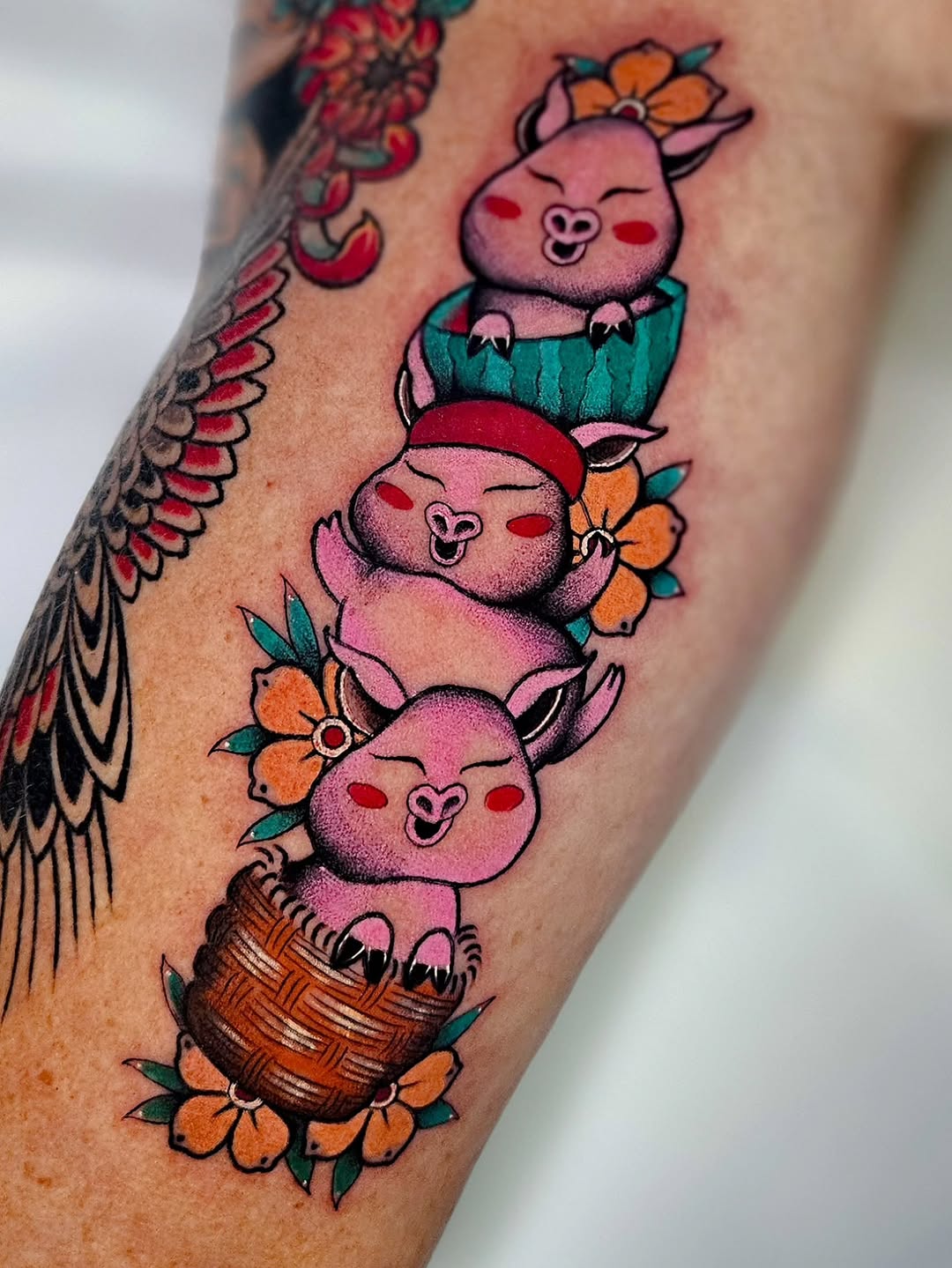 Colorful cartoon piglets stacked with flowers, bold outlines.
