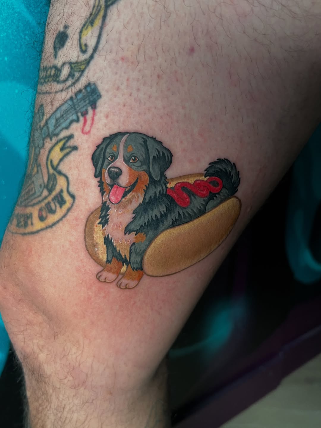 Playful cartoon dog nestled inside a hotdog bun