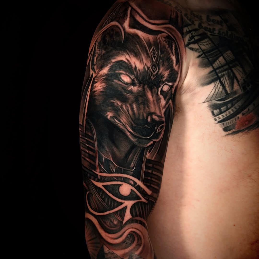 Ferocious black-and-gray wolf portrait with intricate ornamentation