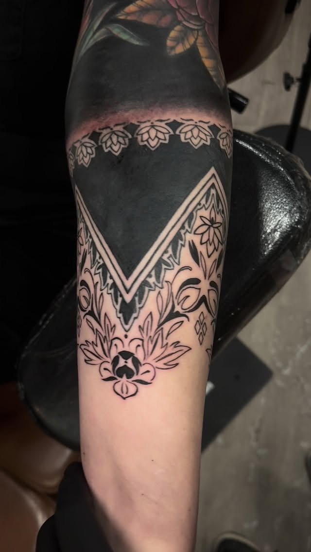 Intricate blackwork pattern tattoo