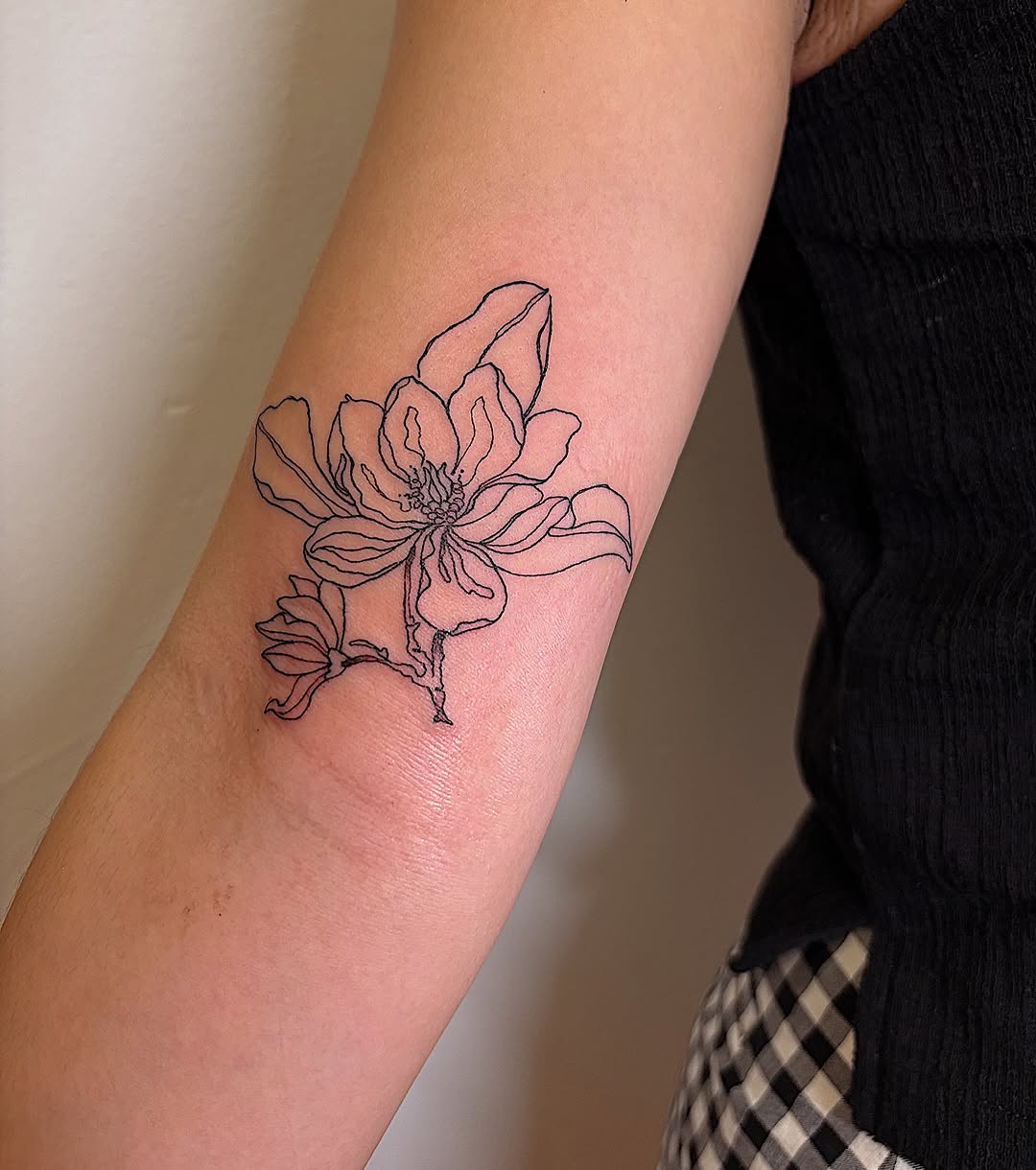 Linework floral tattoo