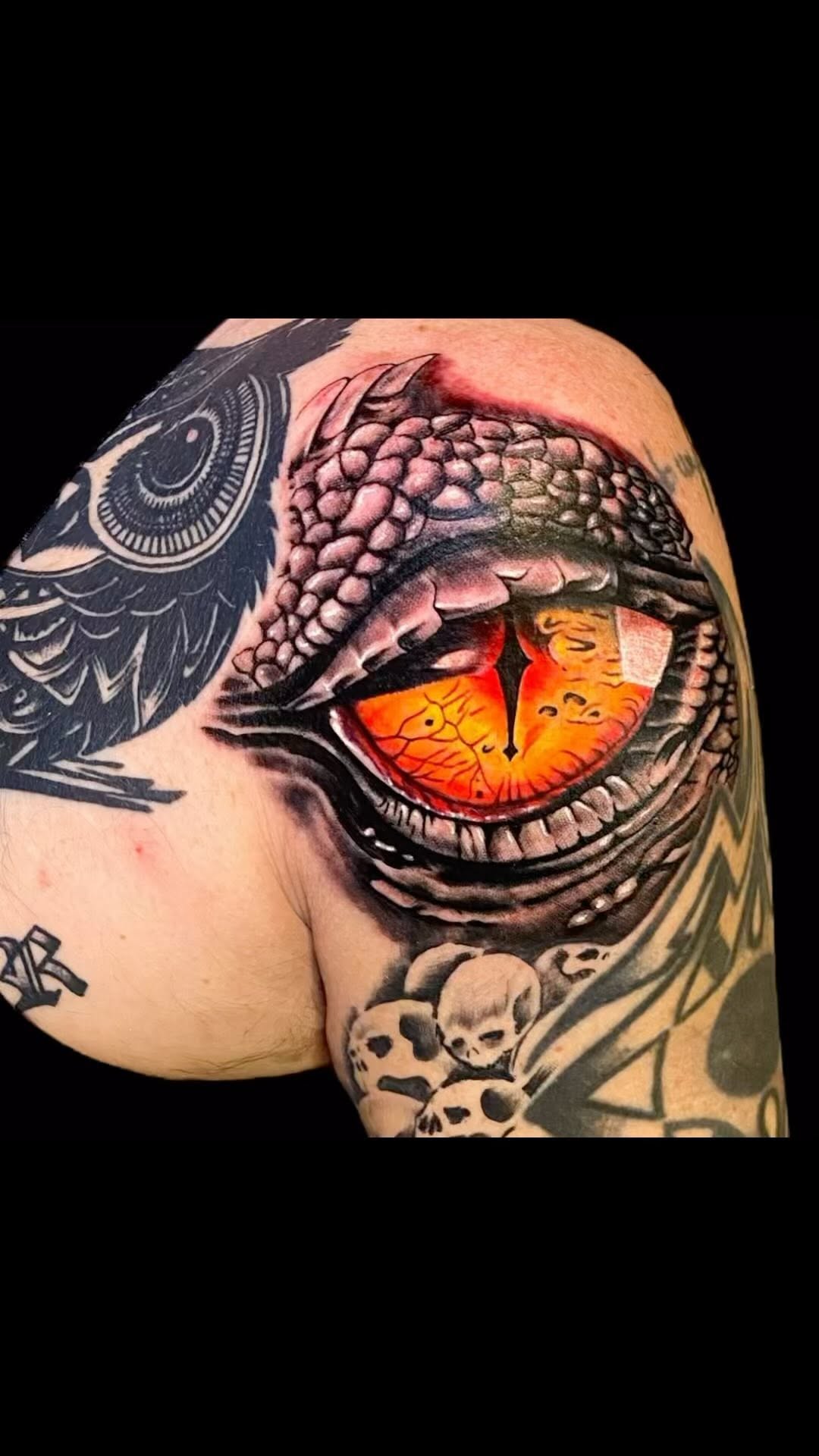Ferocious dragon eye with textured scales and orange iris