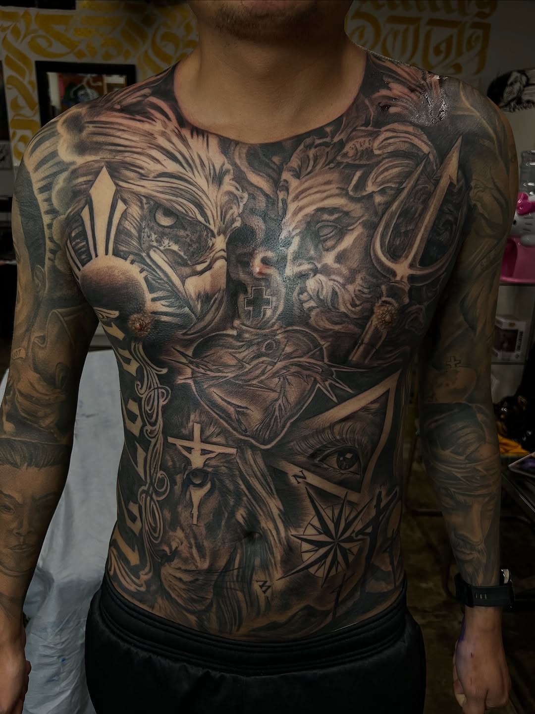 Monumental blackwork chest piece with crosses, stars, geometry