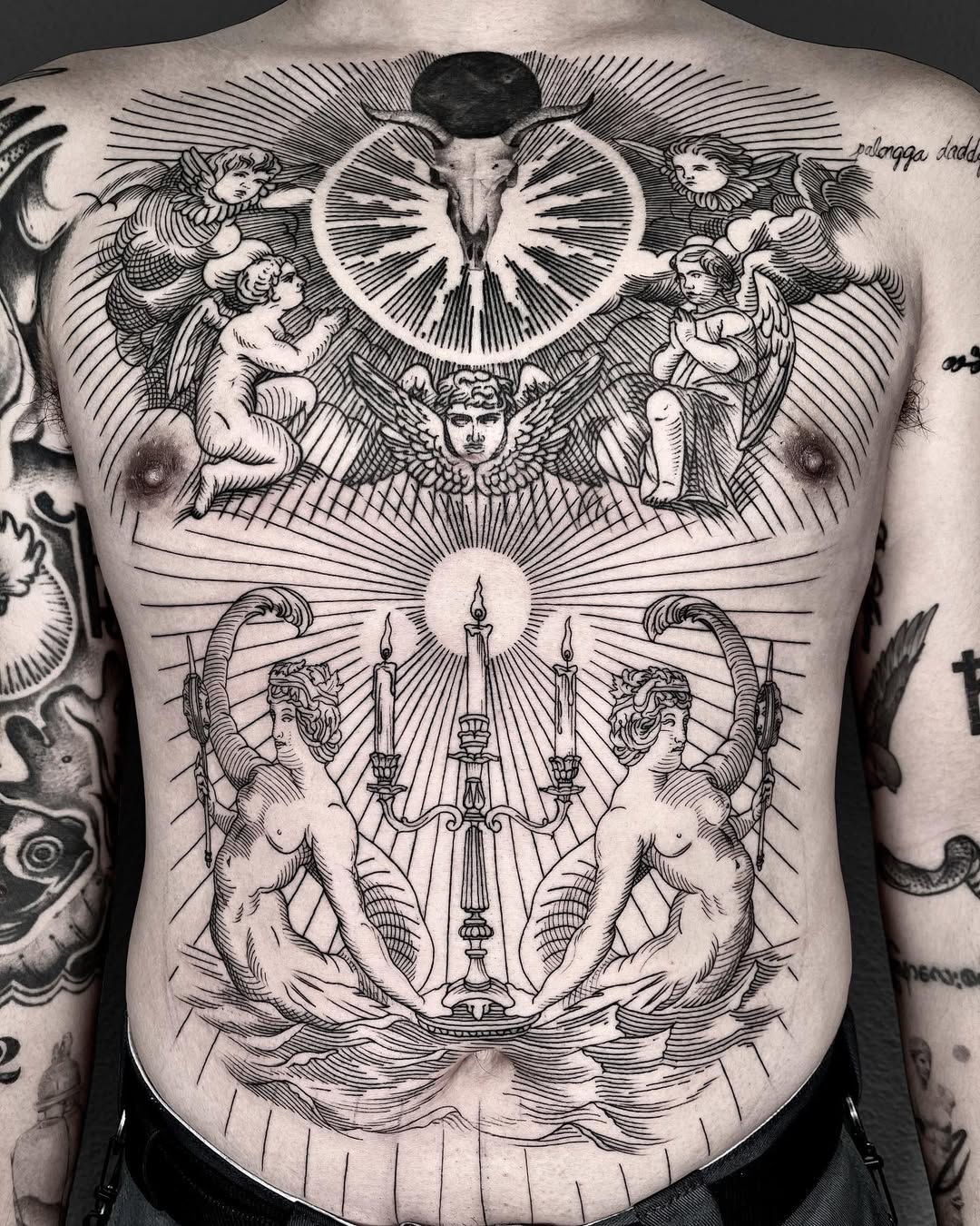 Engraving-style chest piece with angels, sun, and nude figures