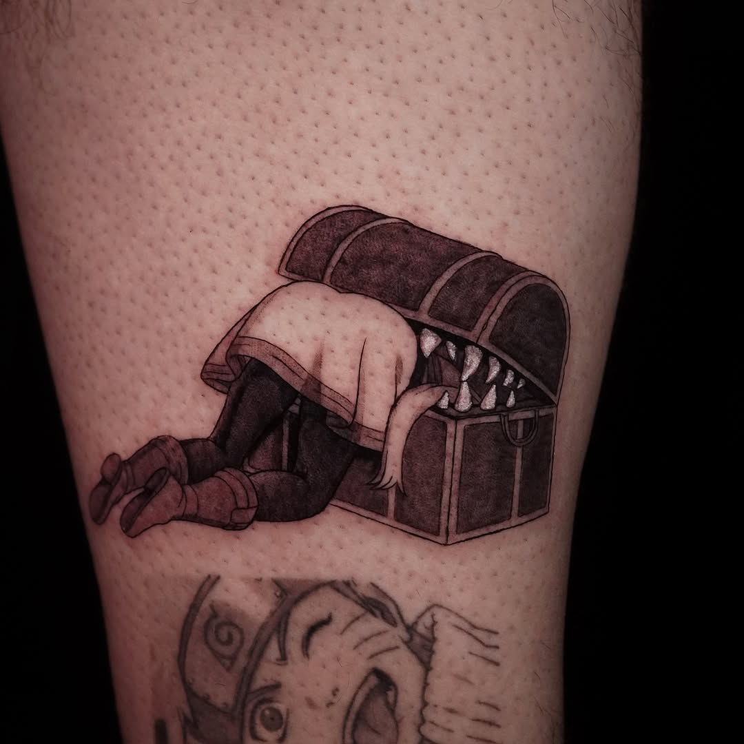 Frieren-inspired mimic chest with kneeling figure tattoo