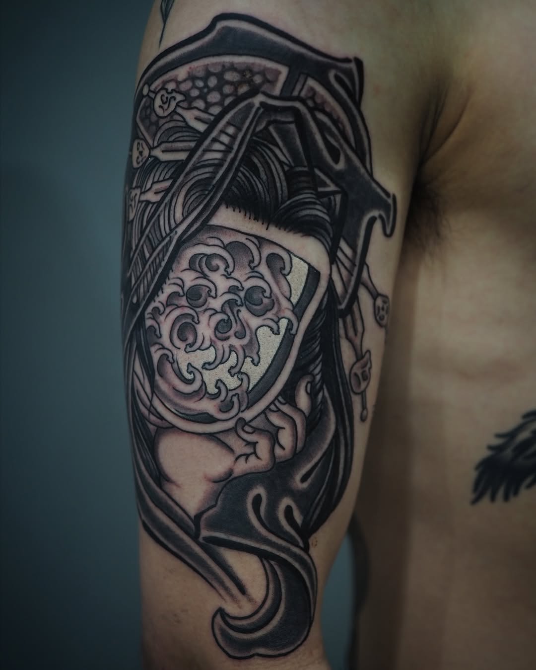 Bold ukiyo-e inspired sleeve with swirling waves