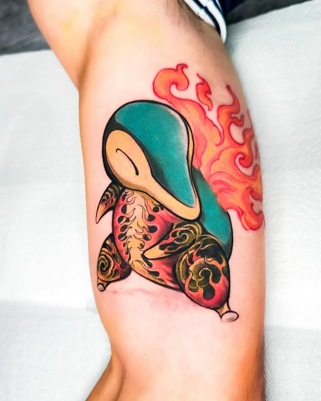 Vivid neo-traditional Cyndaquil bursting with fiery flames.