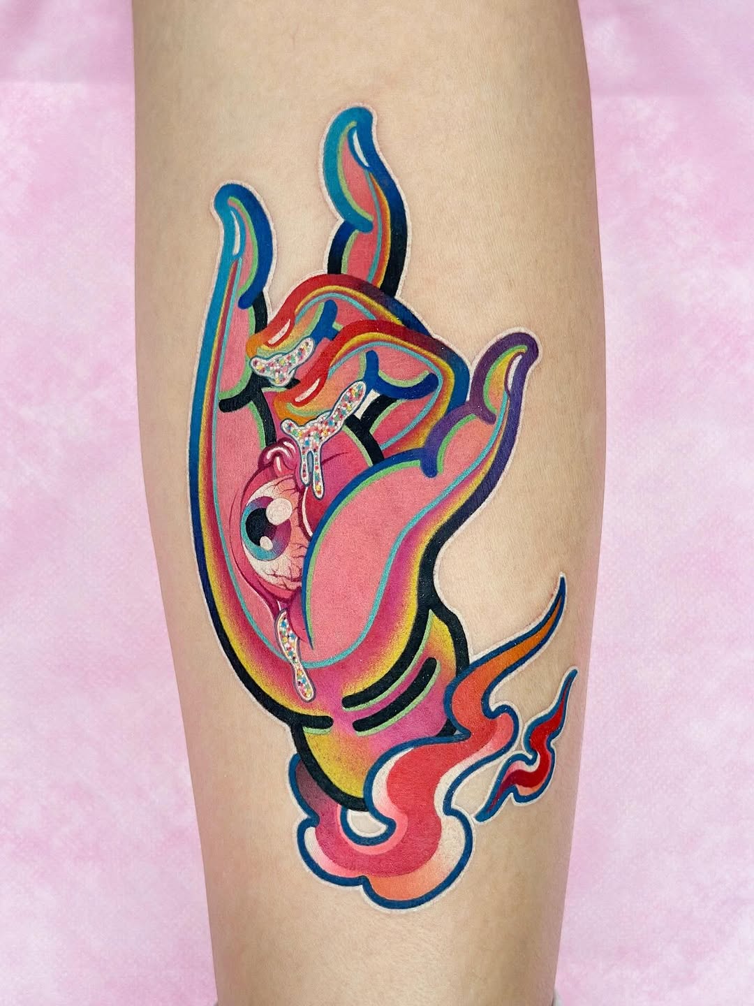 Bold neon rainbow hand design with psychedelic layers