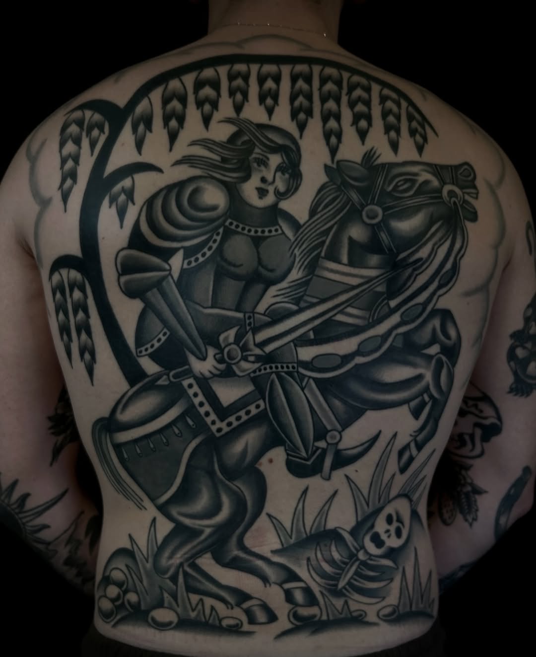 Bold blackwork knight on galloping horse, dramatic shading