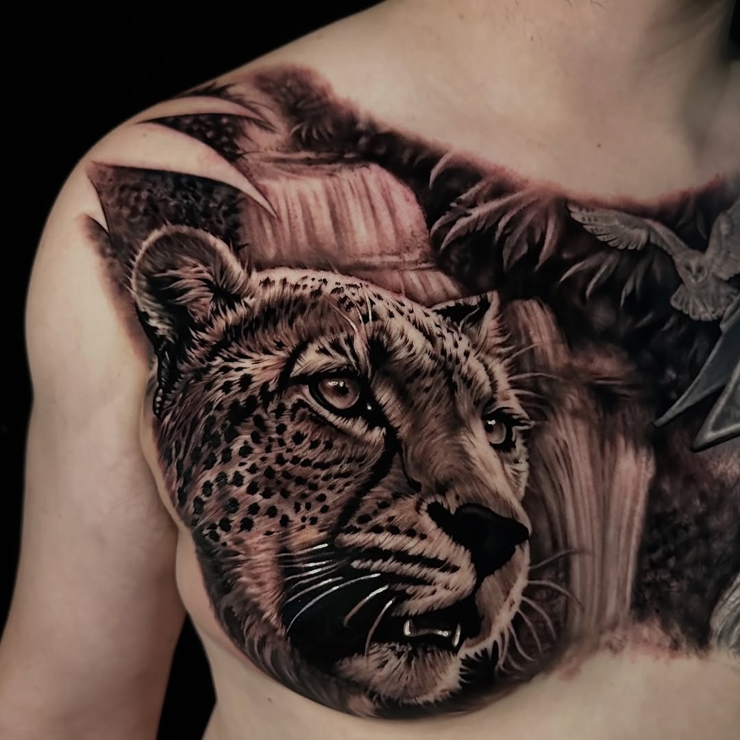 Hyper-detailed black-and-gray leopard portrait across shoulder.