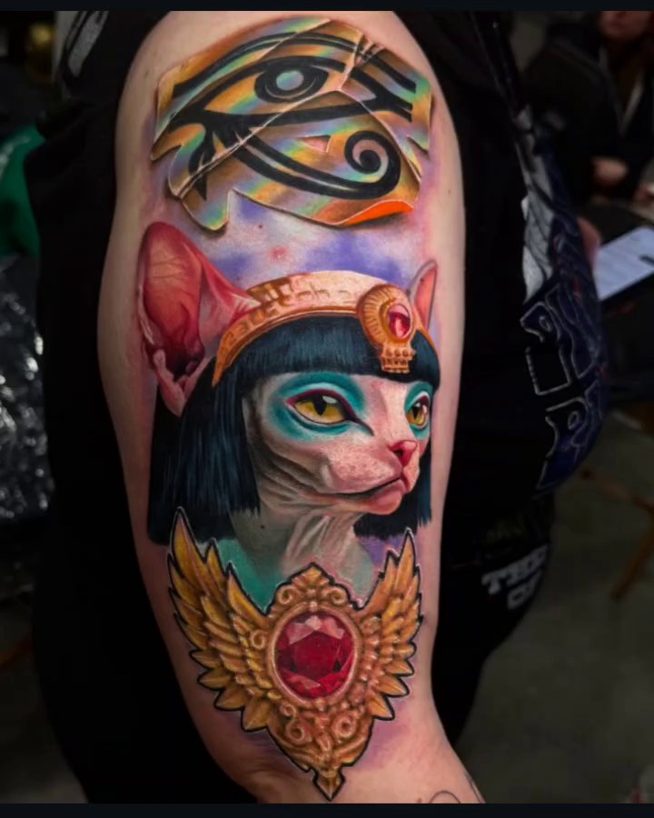 Vibrant fantasy feline portrait with regal headdress and gem.