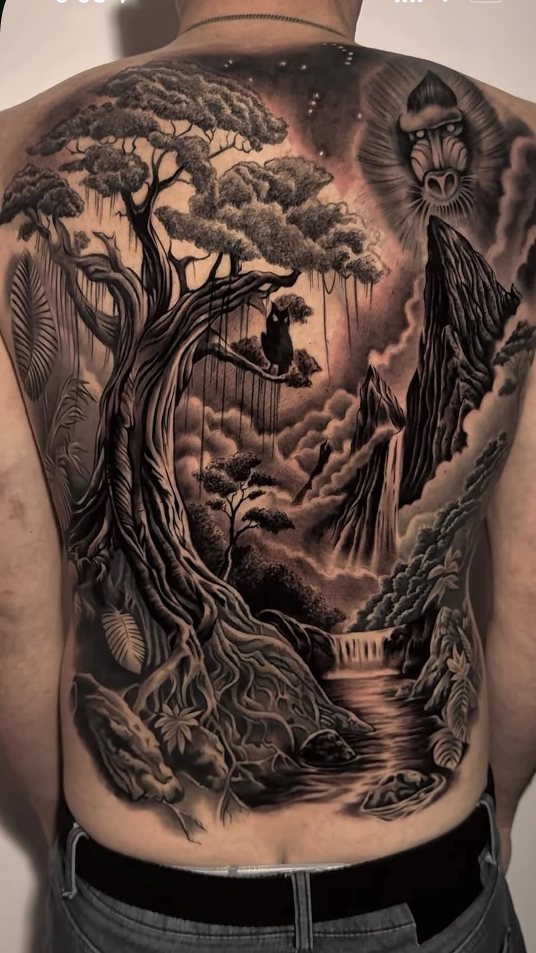 Monumental blackwork landscape with ancient trees and cat